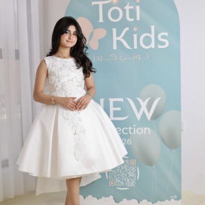 صورة فستان بناتي أبيض بتطريز فاخر مكيادو | فستان بفيونكة خلفية كبيرة - M3761